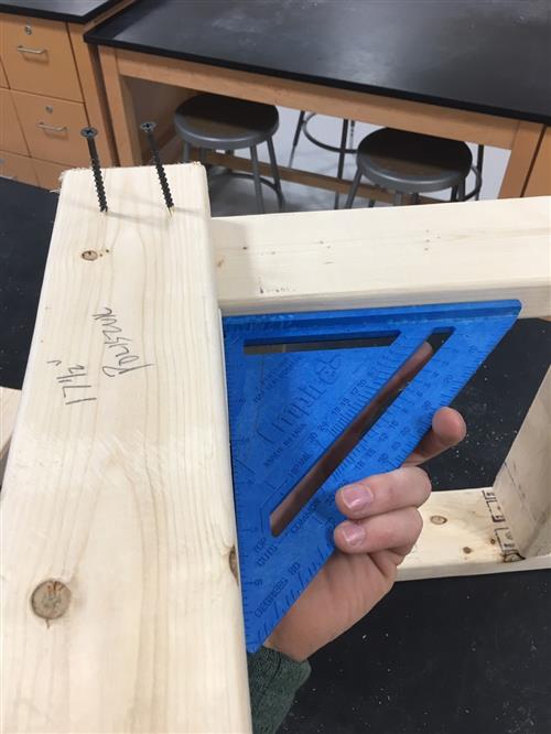 Before tying walls together, check for square and adjust accordingly, then fasten 